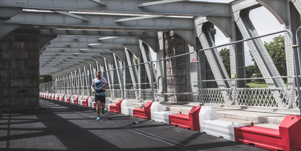 My friend Rob jogging across Ashton Avenue Bridge